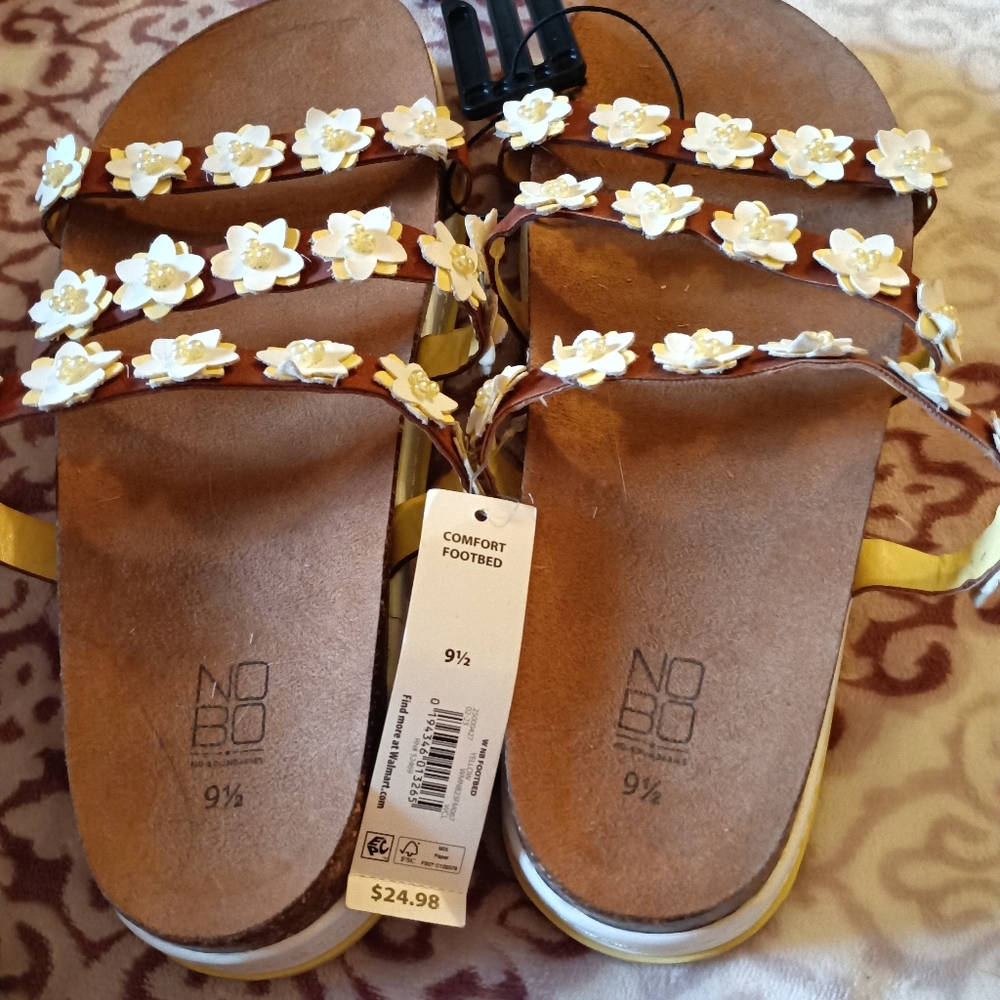 Sandals with flowers on top